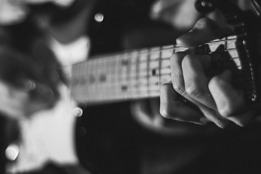 Photo Guitar pick punch: Guitar, pick, punch